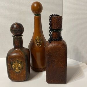 Vintage Leather Covered Decanters X 3 Two made in Italy and one made in Spain.